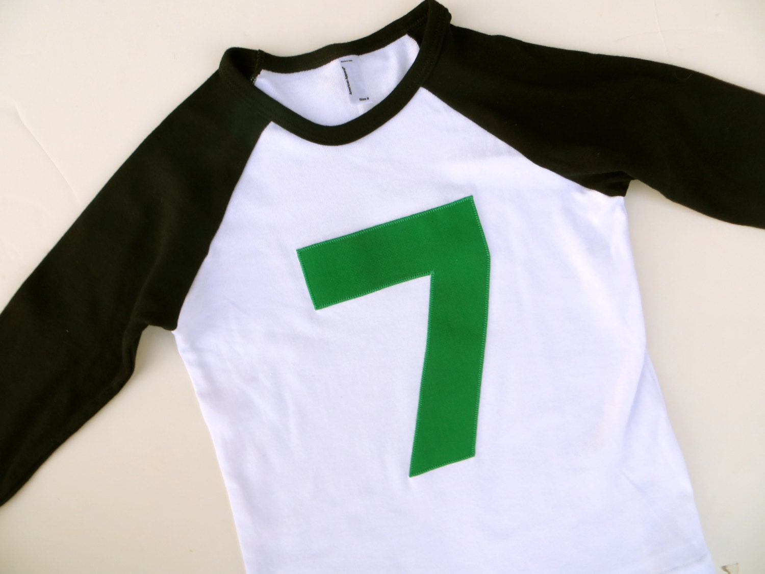 Green 7 on Black and White Baseball Raglan Retro 80s Birthday T Shirt for Older Kids  6, 7, 8, 9, 10