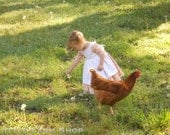 Frontier Country Girl and Chicken in the Dandelion Field  Little House on the Prairie Style