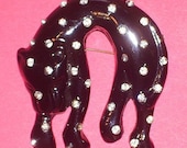 Large Black Thermoset Plastic Leopard Brooch With Rhinestone Spots