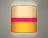 Wall sconce - Abstract orange & pink print. Glowing wall art, mood lighting.