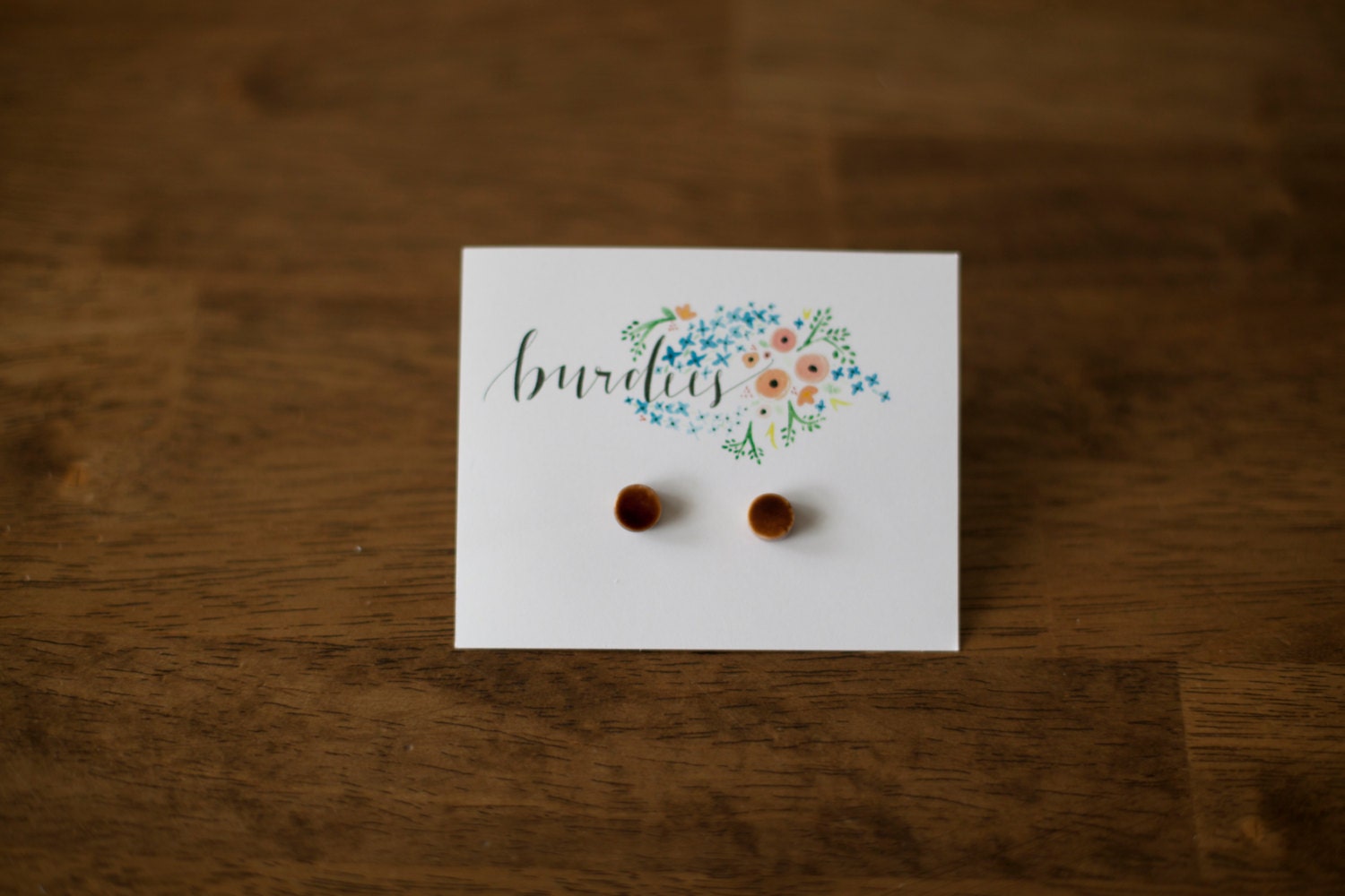 small brown studs