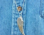 Silver wing and cross charm necklace