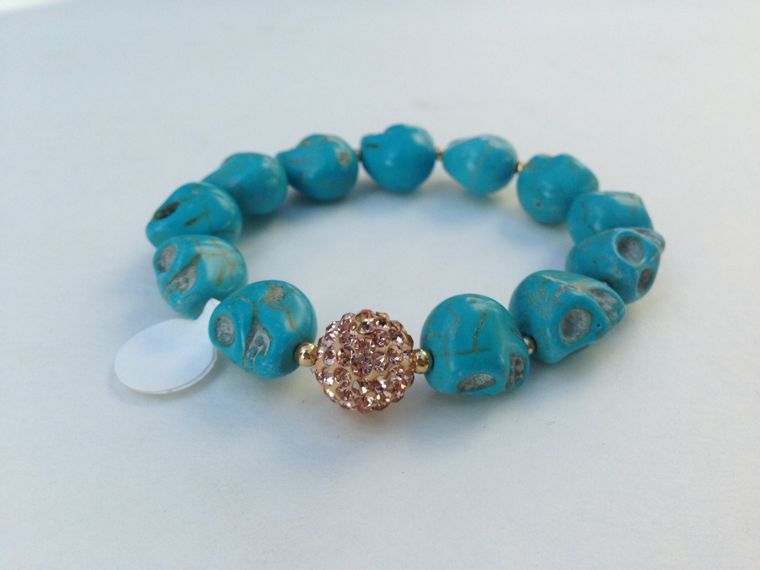 Turquoise skull bracelet with rhinestone beads