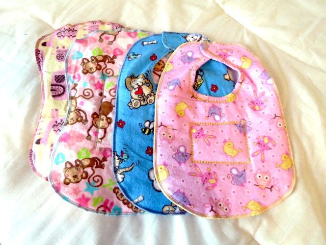 Burp cloth and bib set.  Consists of 2 burp cloths and 2 infant/toddler bibs.  Flannel with polyester batting.  Reversible.