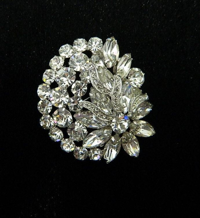 Signed Weiss Vintage clear rhinestone flower and decorative rhinestone ribbon brooch