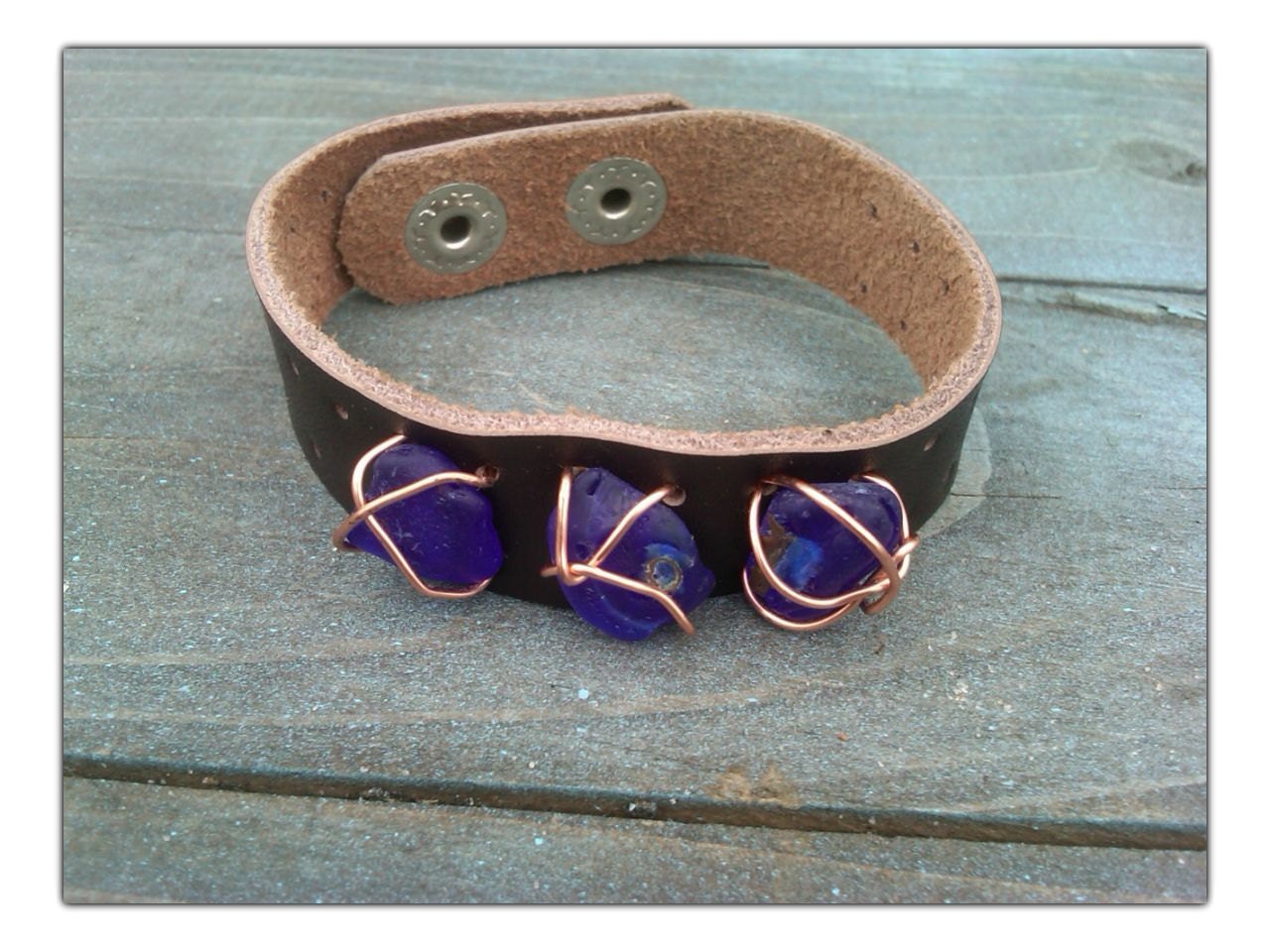Brown leather cuff with blue beach glass