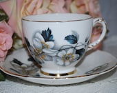 DELPHINE  Vintage Tea cup and saucer. Bone China from England white and grey flowers