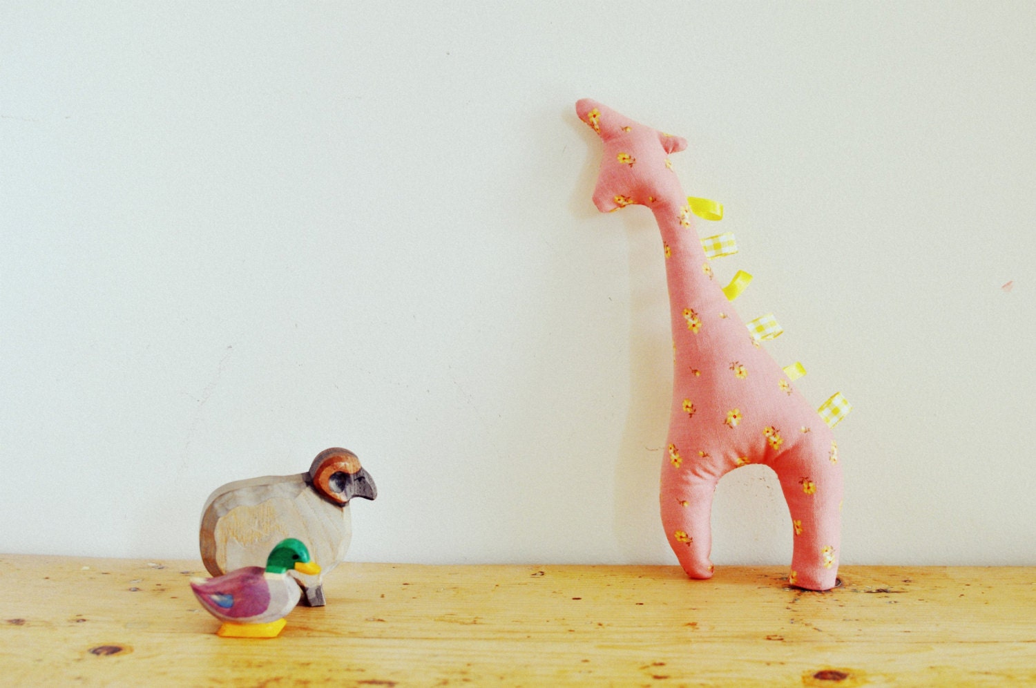 Jolly giraffe taggy tag animal baby toy with pink yellow floral fabric with matching yellow gingham