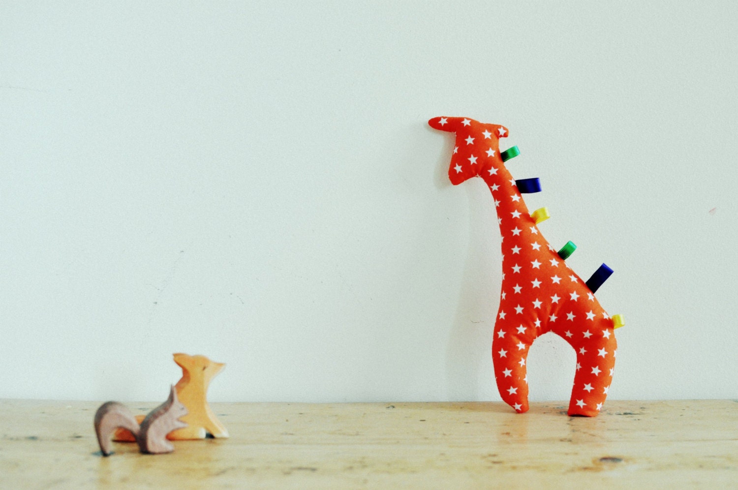 Jolly giraffe taggy tag animal baby toy with unisex orange cotton stars fabric