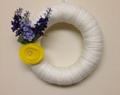 White Yarn Wreath with Yellow Felt Ranunculus and Silk Lavender Flowers