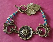 Handmade Antique Gold Heart Charm and Flower  Bracelet with Turquoise / Blue / Green Crystals and Gold Beads