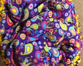 Pet cloud bed gorgeous purple paisley with yellow back. 30 inches in diameter, piled  9 inches high with super soft fluff
