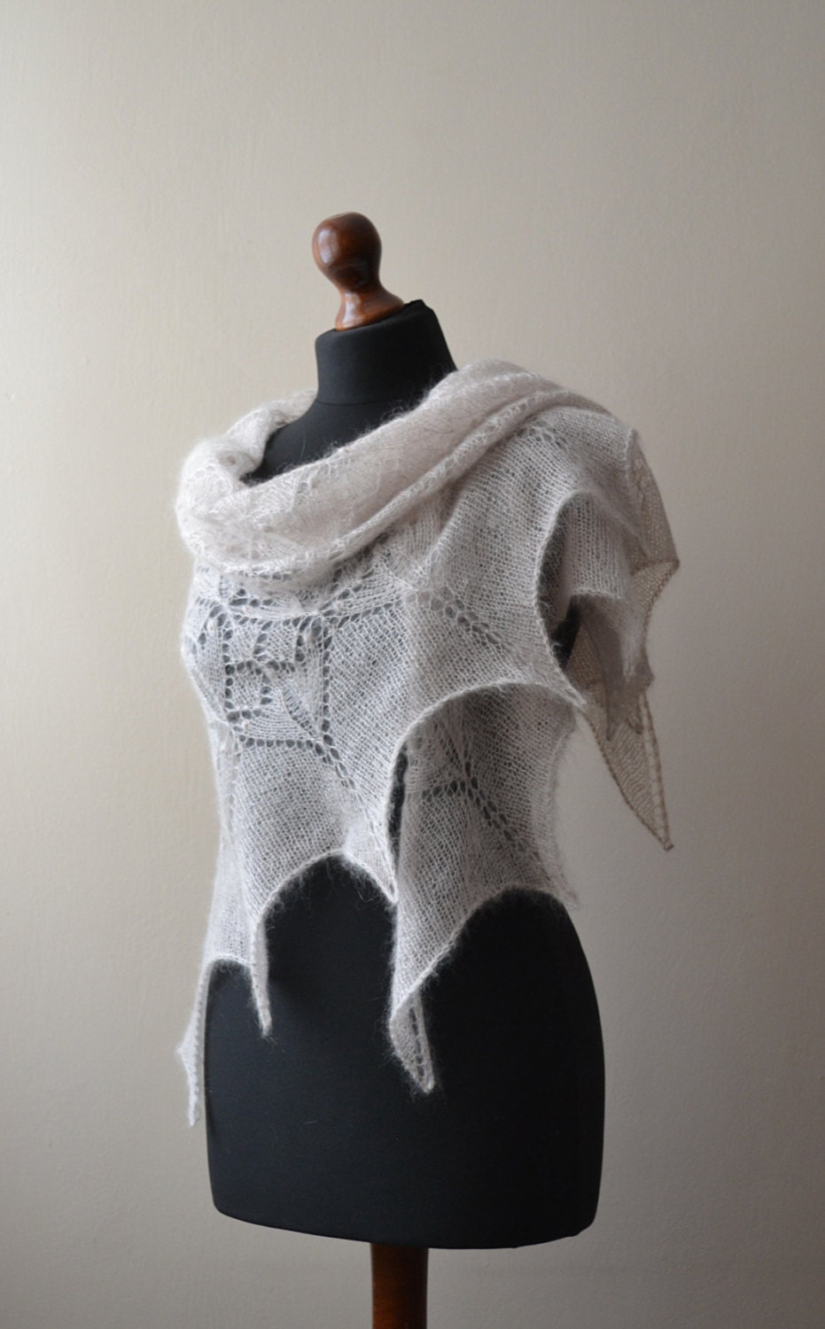 Light beige hand knitted triangular kidsilk lace shawl
