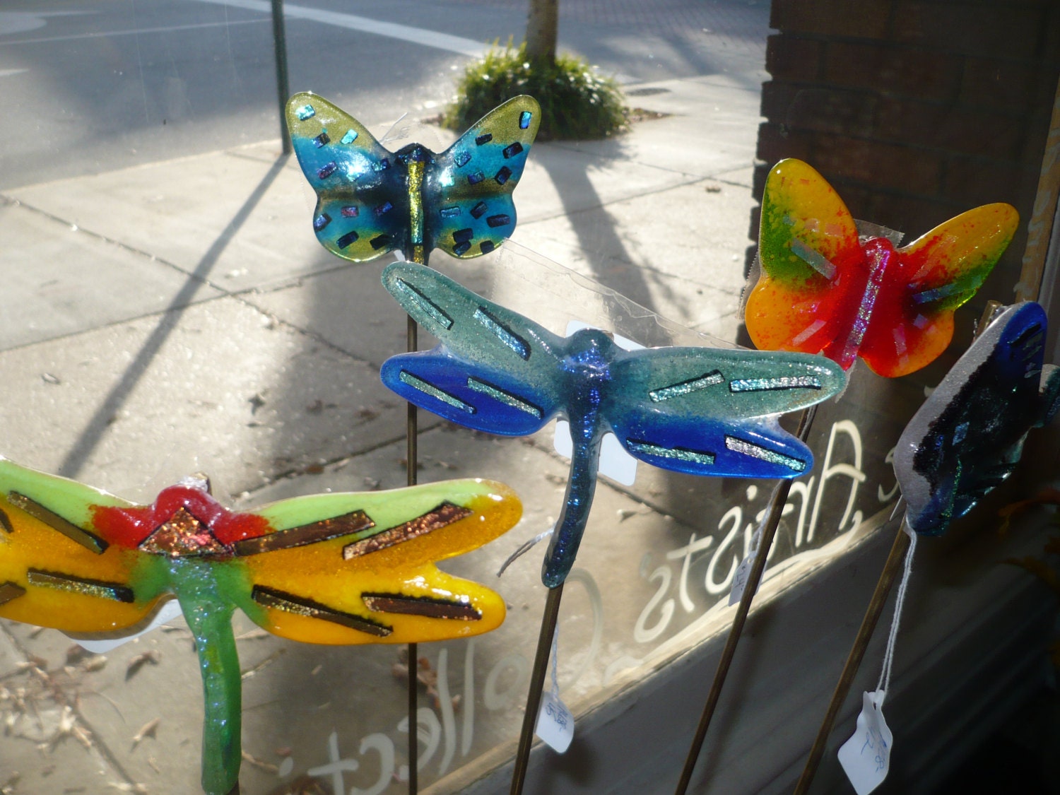 Garden Stakes or Plant Stakes.  Fused glass on a brass rod.  Dragonfly, butterfly, fish and cross designs available.  Many colors available.
