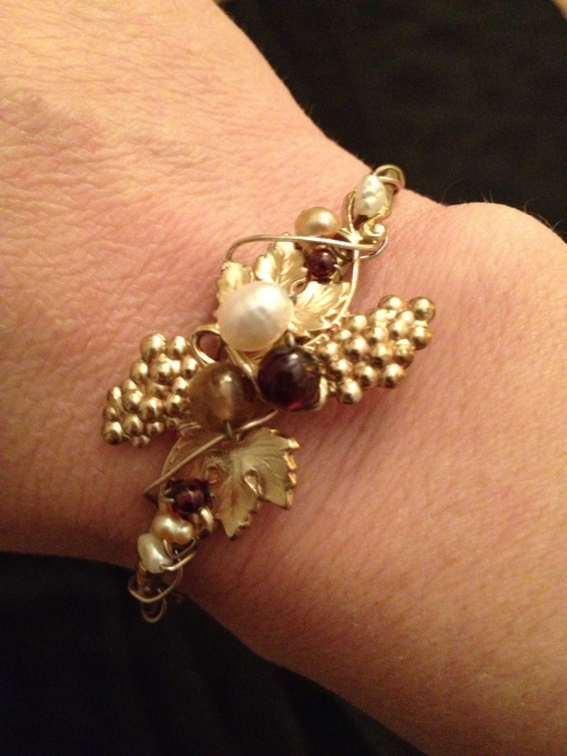 Handmade gold tone and freshwater pearl bangle