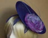 HAT/FASCINATOR ... a saucer style hat mounted on a small round sinamay base decorated with organza flowers and ostrich spines.