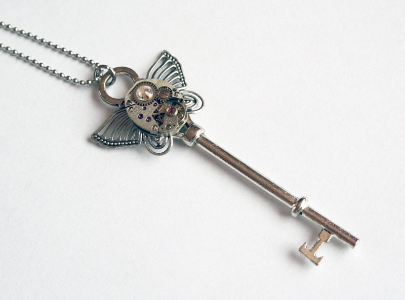 Steampunk Necklace - with Genuine Vintage Watch Movement, Swarovski Crystals, Silvered Butterfly on a Stainless Steel Chain