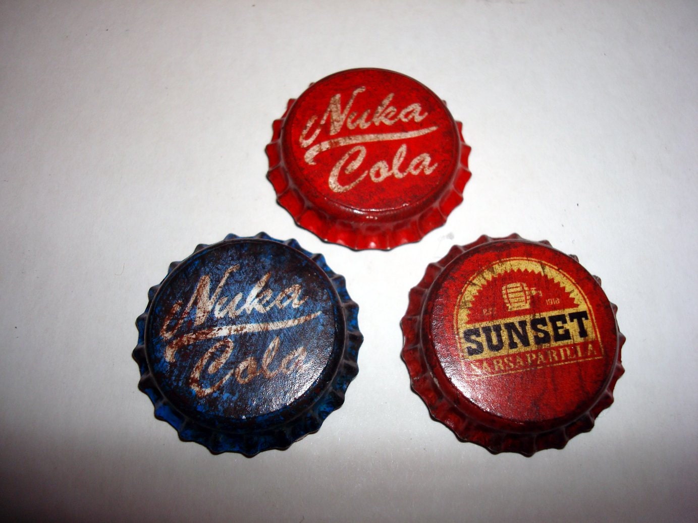 Fallout Universe Inspired bottle cap fridge magnets. Set of 3 Nuka Magnets.
