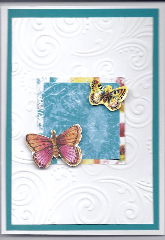 Pair of butterfiles on an embossed field.