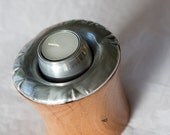 Recycled wood and spun metal candle holder