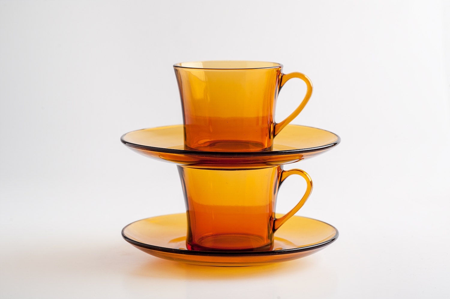 Set of 2 Glass Tea and Coffee Cups with matching Saucers. Vintage French Orange Glassware. Mid Century Retro - Kitchen and Home Decor