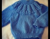 Handmade knitted baby jumper