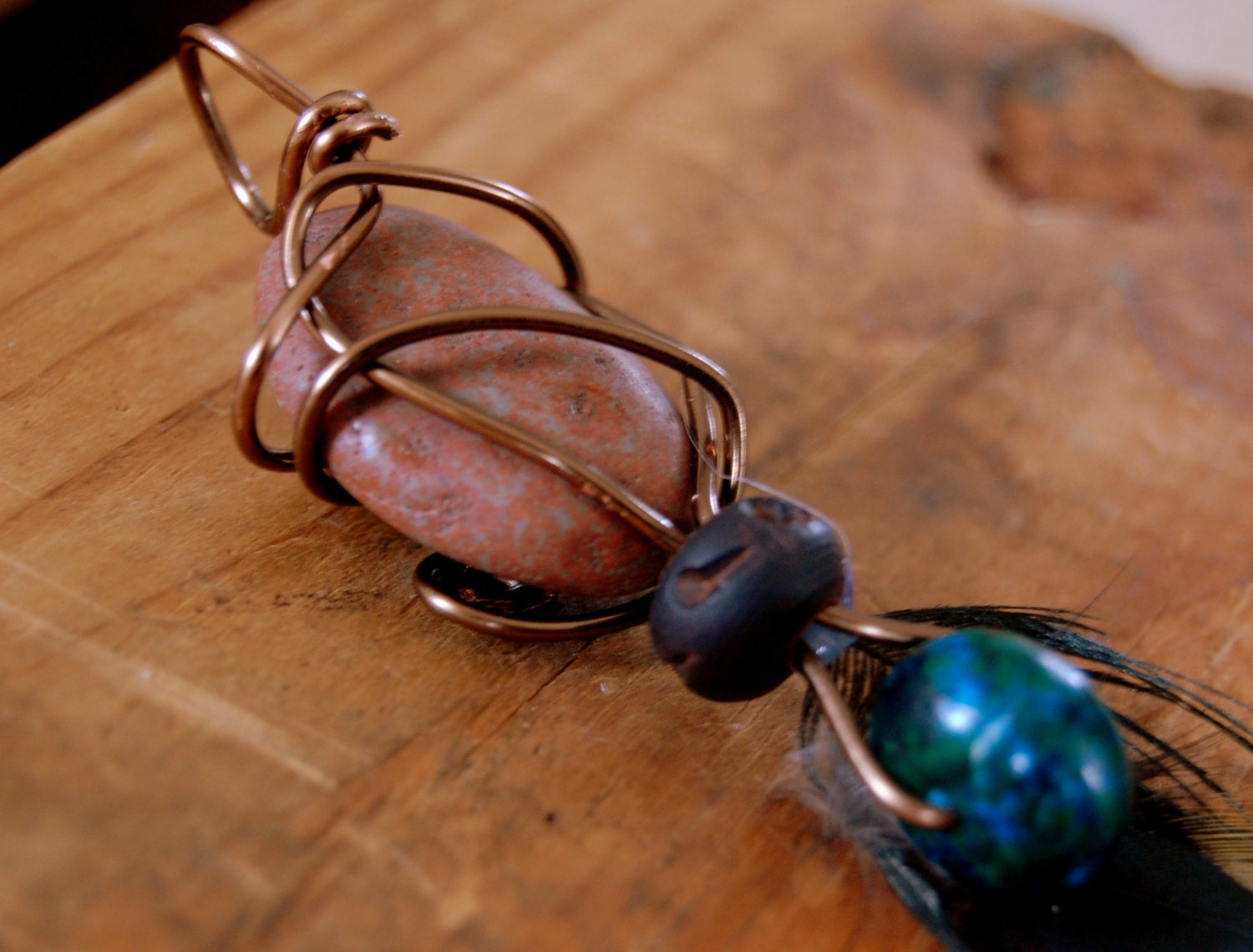 Wire Wrapped Stone And Feather Pendant