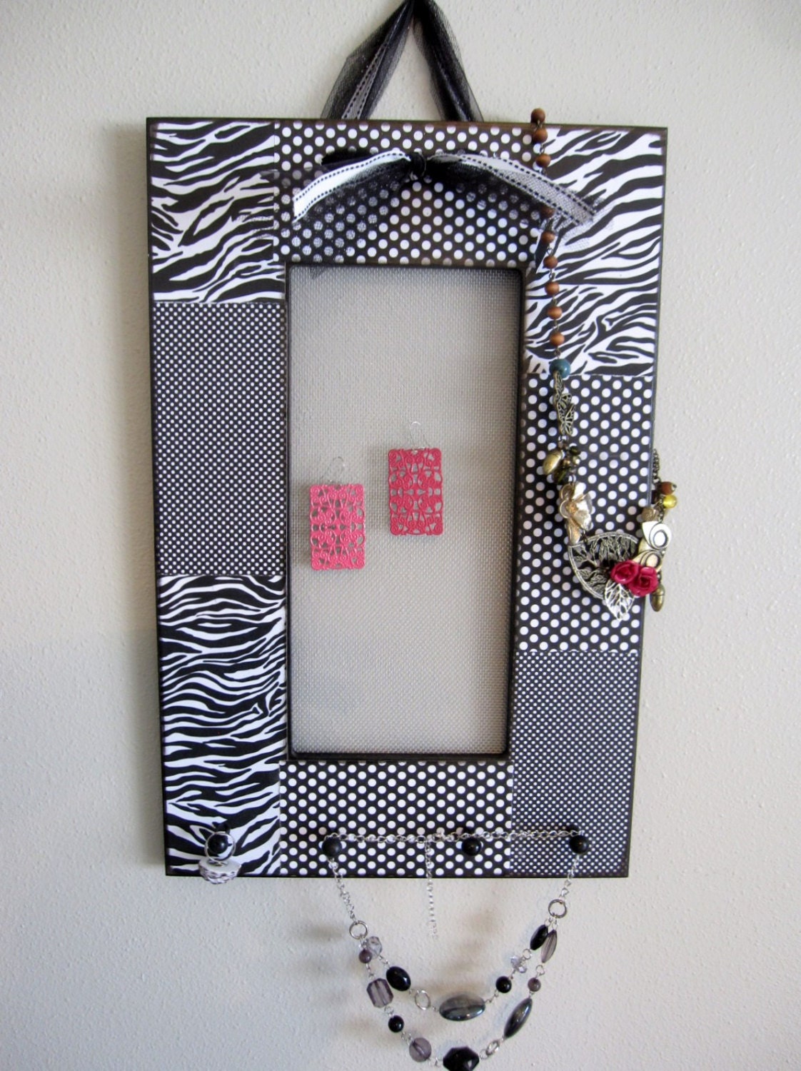 Custom designed jewelry holder to organize all your jewelry so it's on display to accessorize your next outfit.
