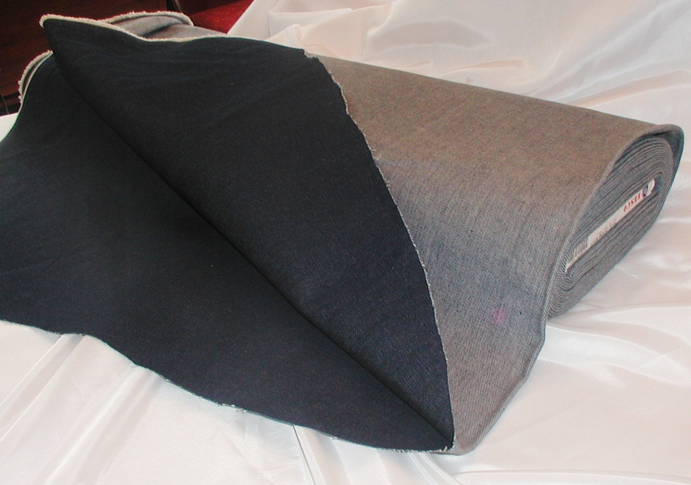 100% Cotton Navy Denim 58-60" by 12 yards.