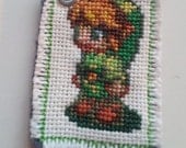 Legend of Zelda Link cross stitched pendant