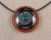 Revolver - Hollow lampwork blown boro incalmo disc bead by Beau Barrett