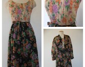 70s does early 60s day dress, floral beauty sleeveless dress, pin tucked bodice detail, matching jacket.
