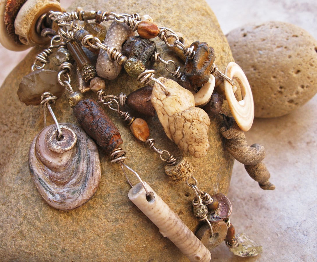 Primitive Talisman Pendant with Sterling Silver, Fossils, Rustic Clay, Ancient Glass, Shell, Handmade Metal Beads, and Deerhide
