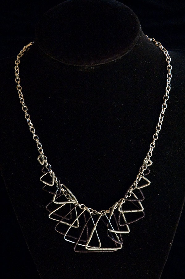 contrasting black and silver toned wire wrapped triangles necklace