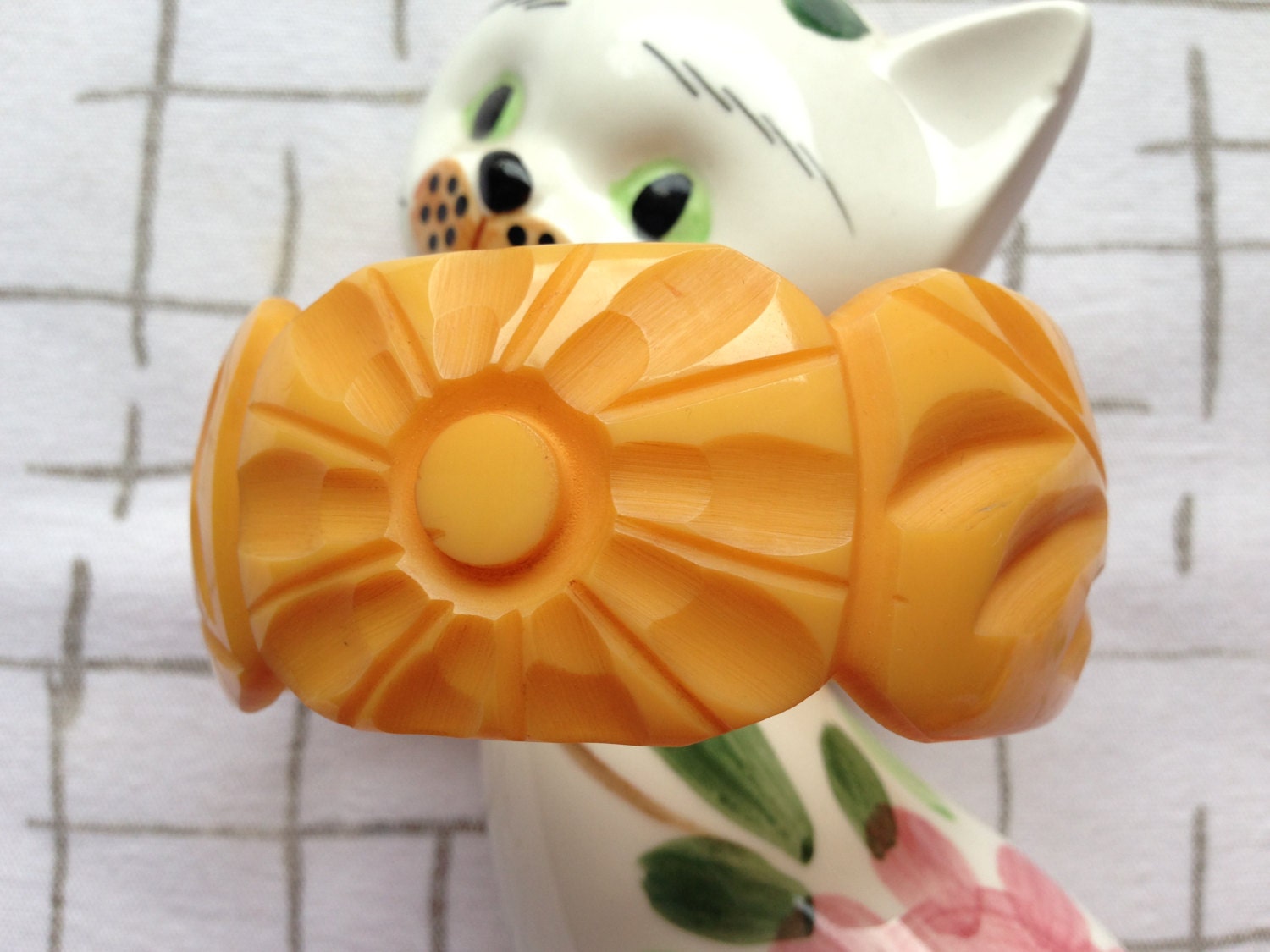 Unusual yellow carved wide floral, Bakelite bangle.