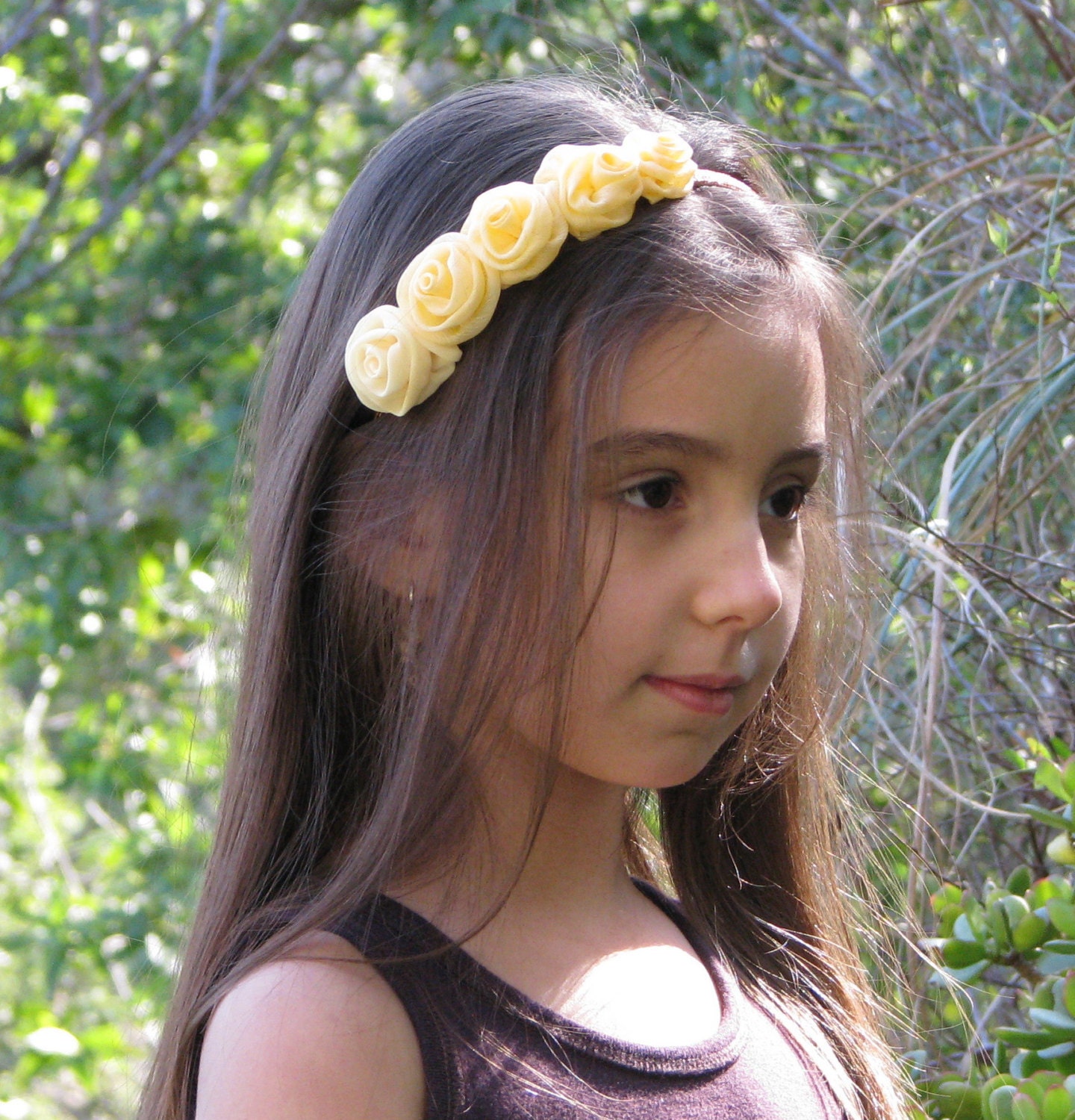 Floral headband with small roses in shades of creamy yellow, child size
