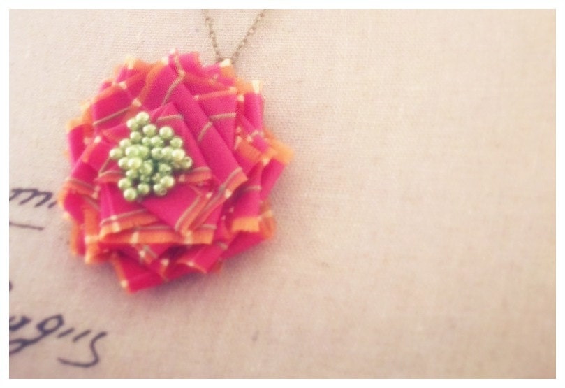 Irene Flower Pendant Necklace. Raspberry pink and lime green beaded fabric flower on long chain handmade by Cardinal House in Atlanta.