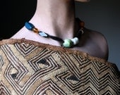 Earth and Sky--an Artisan Bead Necklace on Waxed Cotton Cord with a Handwoven Closure