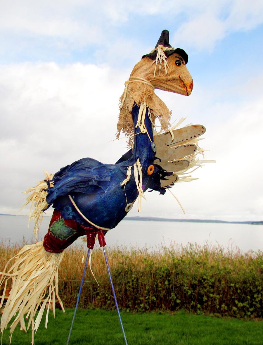 The Scarecrow an OZ series handmade yard art flamingos using an upcycled plastic flamingo base, weather resistant paint, paper mache