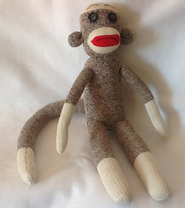 Classic brown Rockford Red Heeled Sad Sock Monkey with a Frown Face