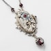 Steampunk Necklace Steampunk jewelry vintage watch movement garnet red crystal Neo Victorian silver filigree leaf Statement Necklace 1942