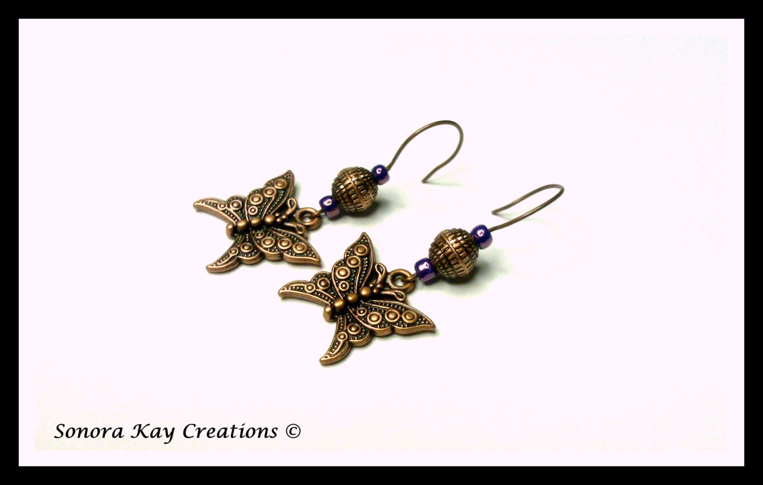 Metamorphosis Copper Butterfly Earrings with Purple Accent Beads