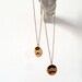 Pendant. Soldier printed in wooden circle