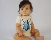Blue Beetle Organic Baby Onesie in Natural