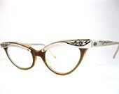 combo cat eye glasses. plastic with metal aluminum browline. ornate floral etching. Liberty size 44-20.