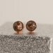 eco resin stud earrings - green blue resin and metallic copper flakes - copper and silver settings