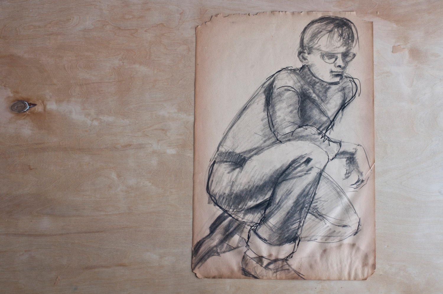 vintage drawing of kneeling man