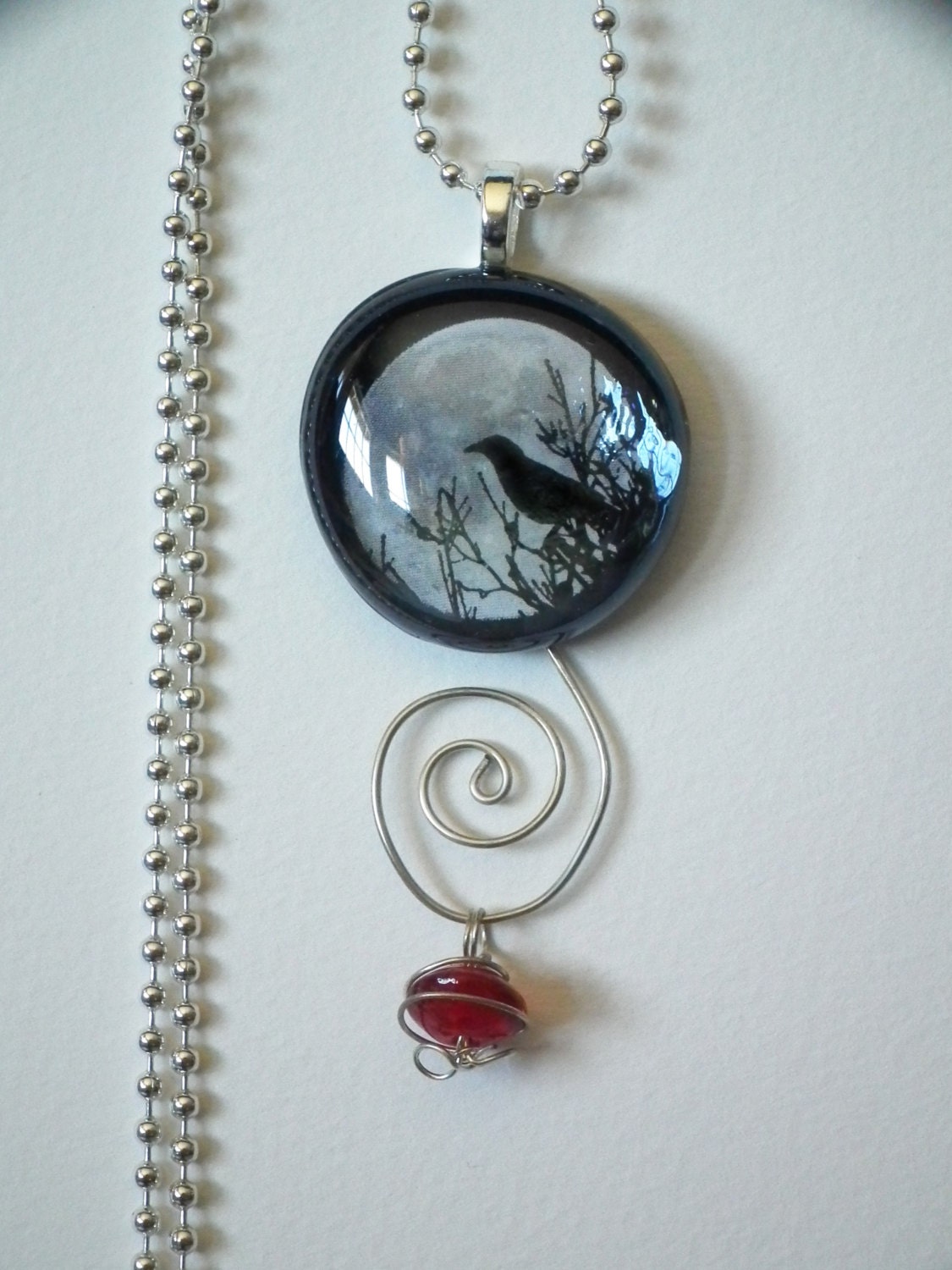 Unique pendant with silver wire and colored dangle, moon, crow, raven, black, white, grey, gothic, Poe, 1 inch, ball chain, glass, photo