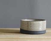 black and white bowl. stoneware pottery straight bowl . black clay with white glaze .  pottery stoneware modern minimal ceramic