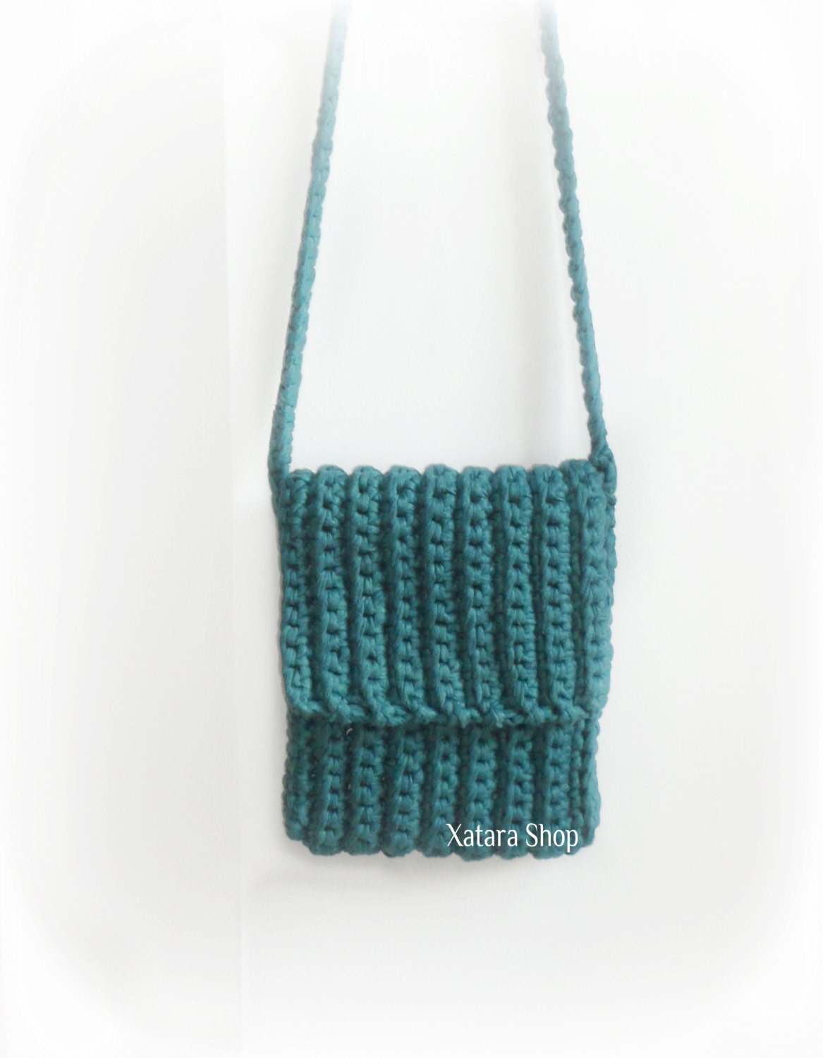 Crocheted messenger shoulder bag in teal green. Handmade crochet iPad bag.